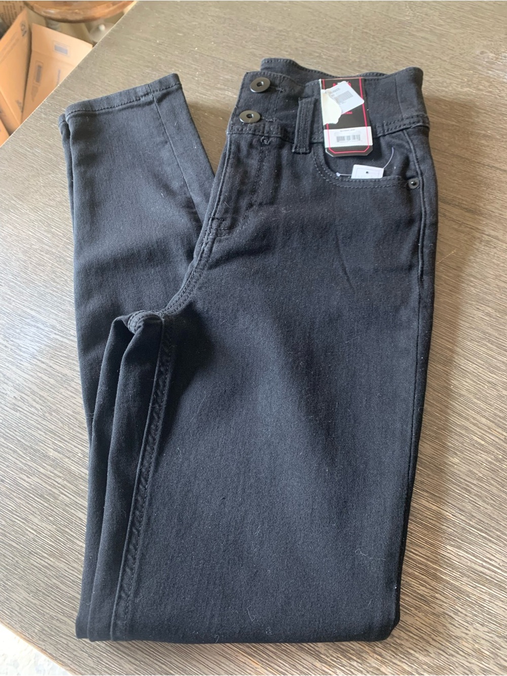 New ladies black jeans size 5! $10. Bin 14.